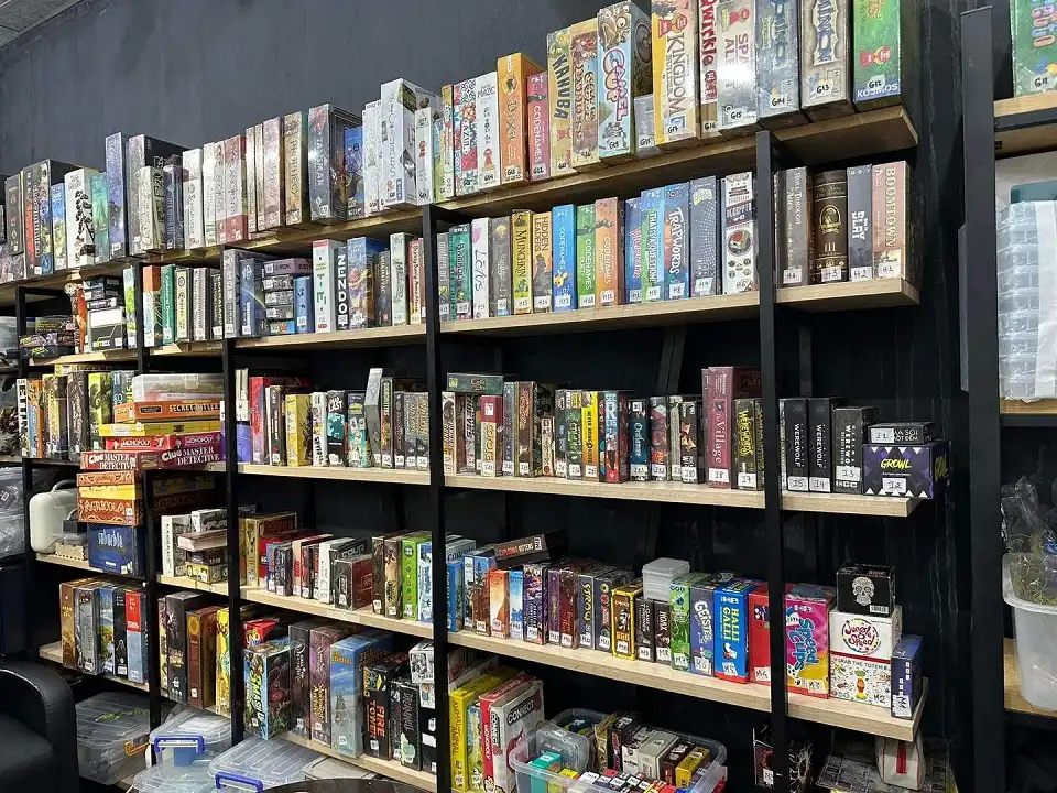 Board games on the right shelf