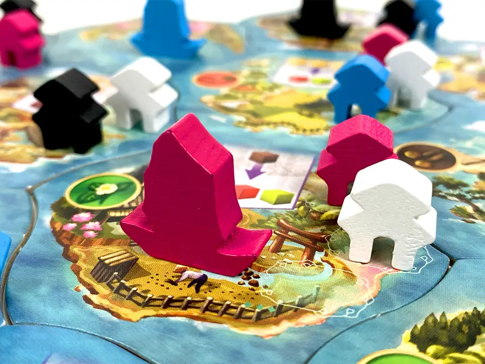 Century: Eastern Wonders board game meeple close-up | Source: Next Move Games