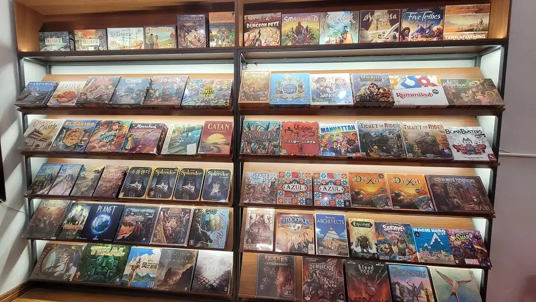 1st Game shelf of CYA board game coffee shop in Da Nang